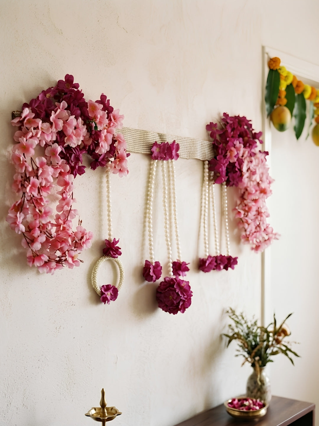 Artificial pink & purple flower with moti ring toran