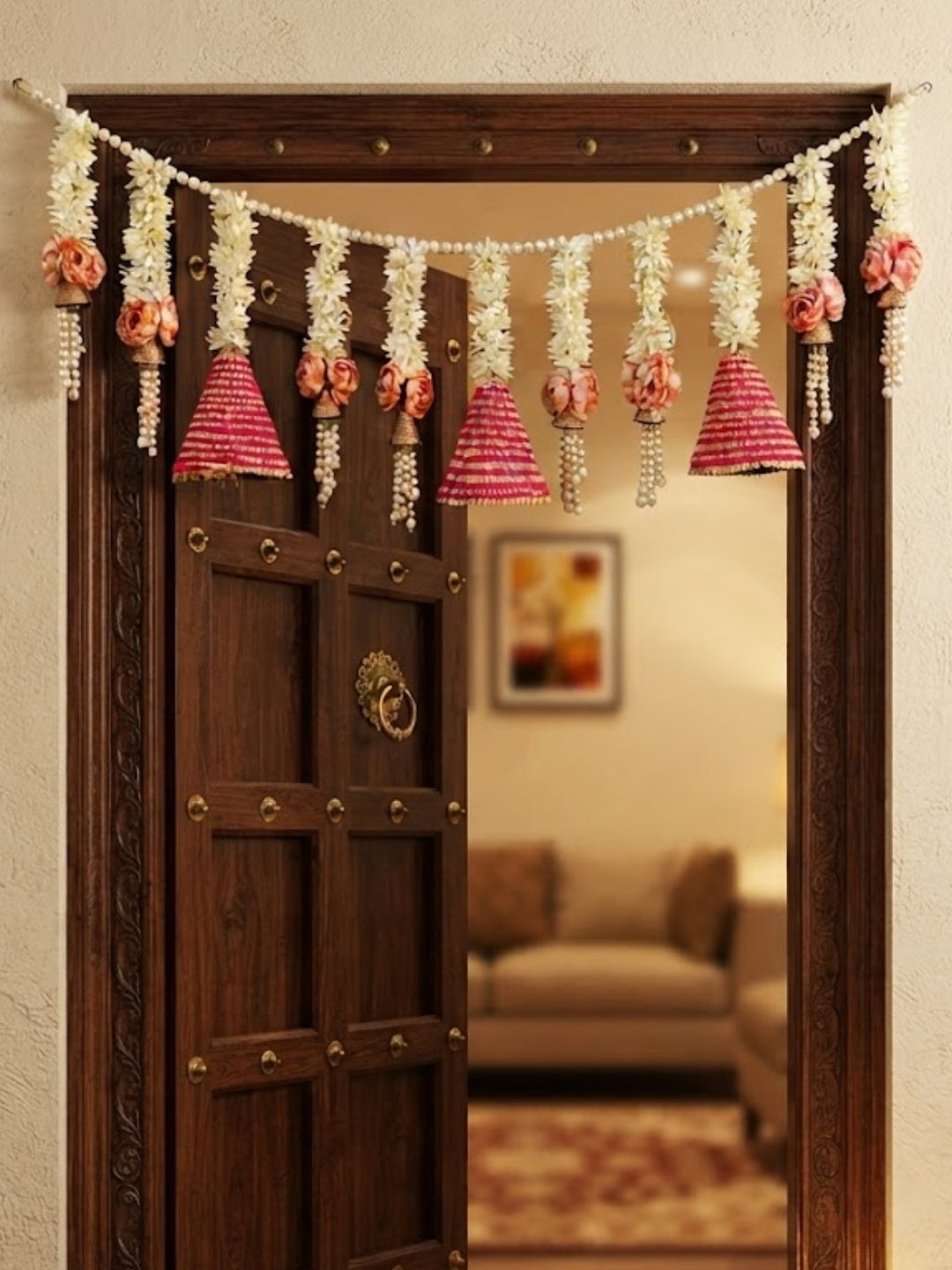 Artificial gajra with pink flower and large pink gota cone toran