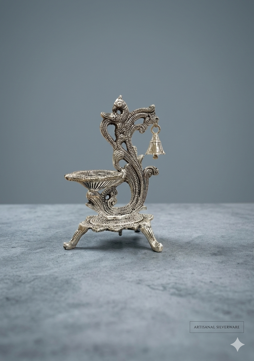 Silver Plated Peacock Shape Diya with Hanging Bell
