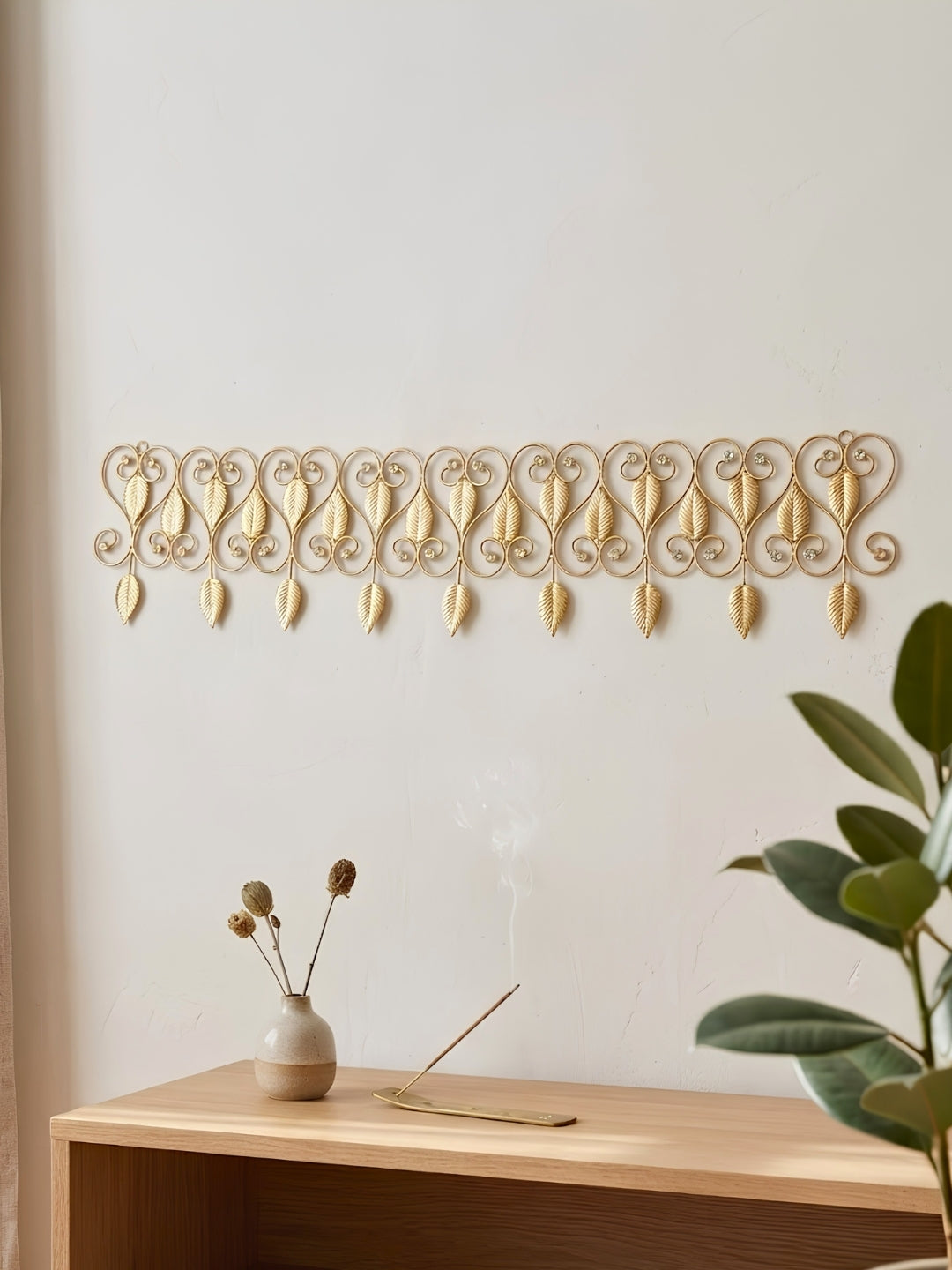metal gold finish paisley toran with leaf