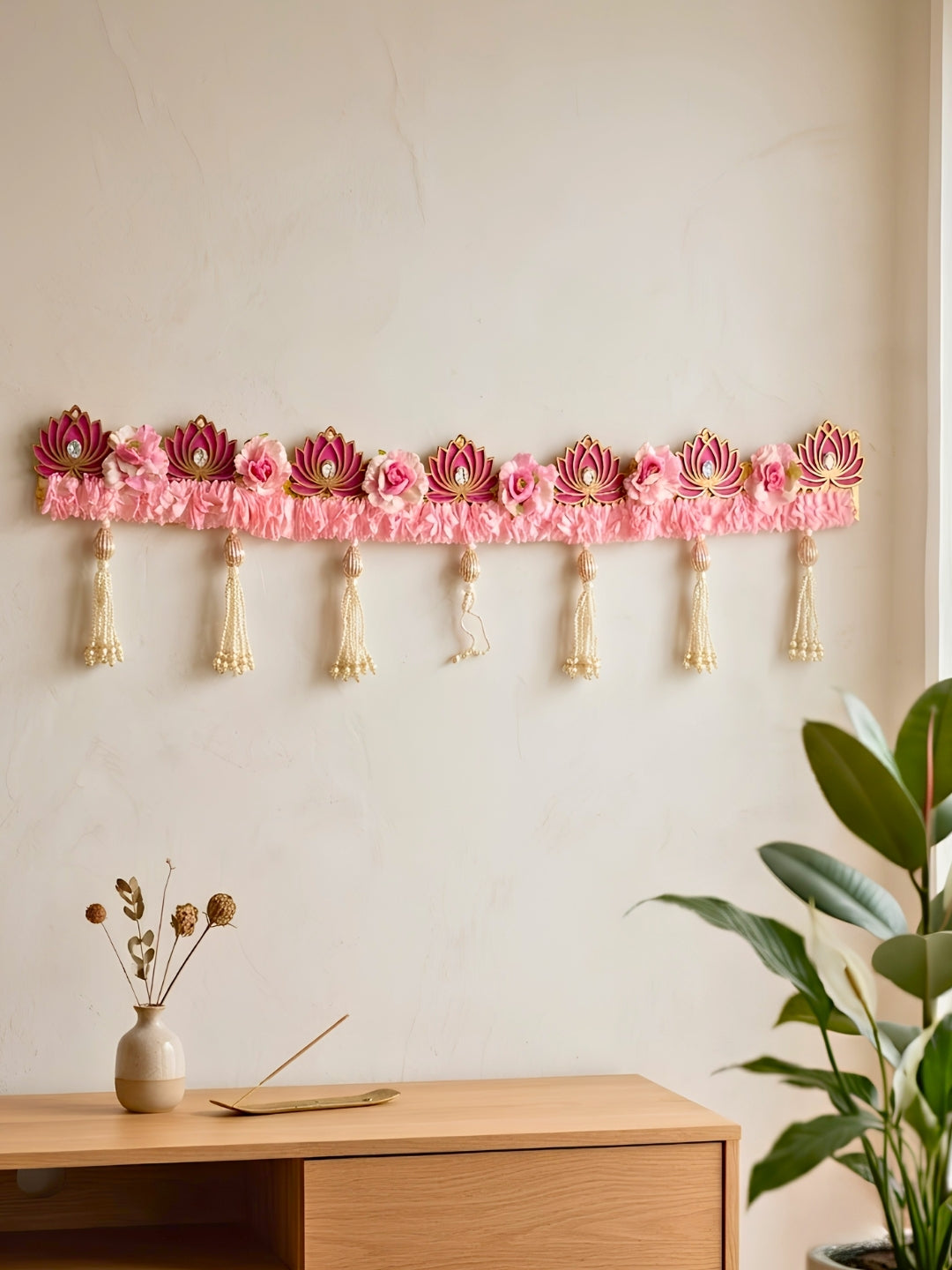 Artifical pink gajra with lotus cutouts and pink flower toran