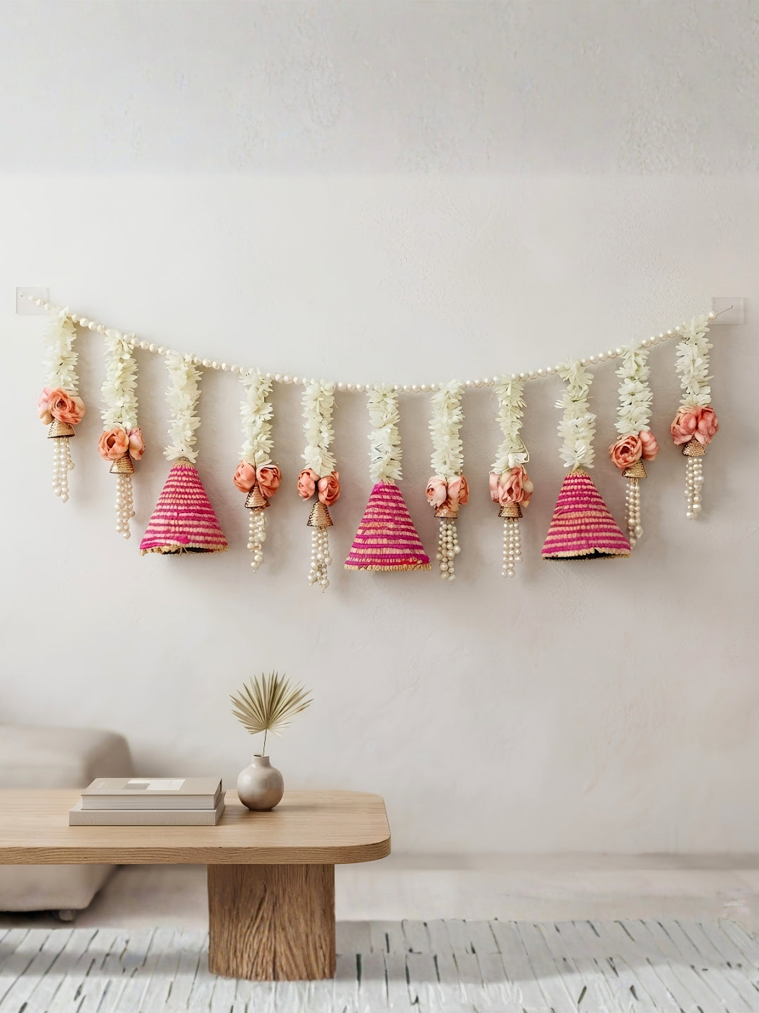 Artificial gajra with pink flower and large pink gota cone toran