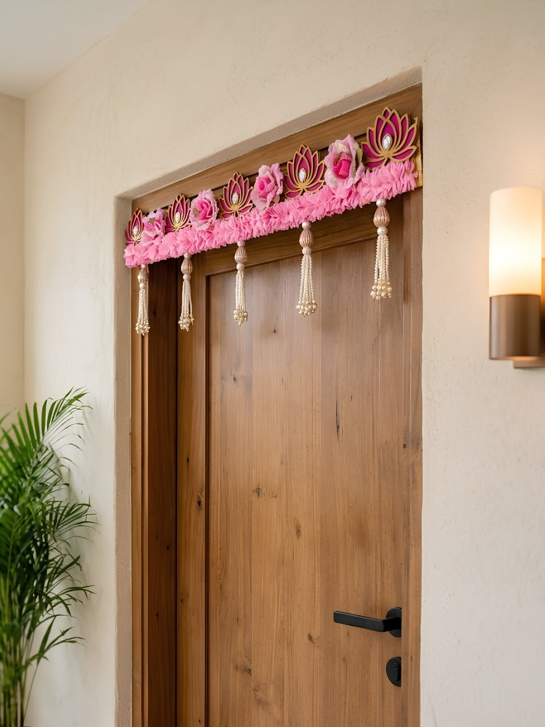Artifical pink gajra with lotus cutouts and pink flower toran