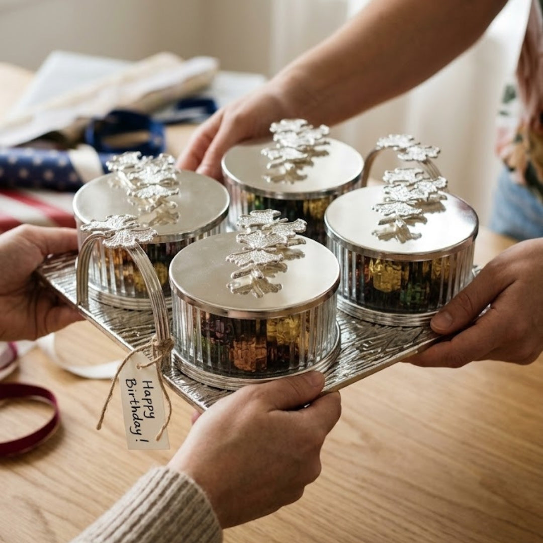 White Metal and Glass 4-Piece Storage Jar Set